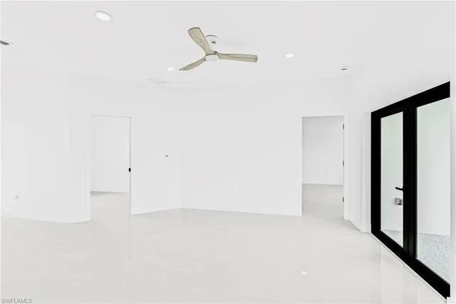 an empty room with windows