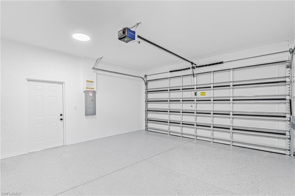 343 Pullman Street Lehigh Acres, FL 33974 - Photo 33 of 48 a view of an empty garage