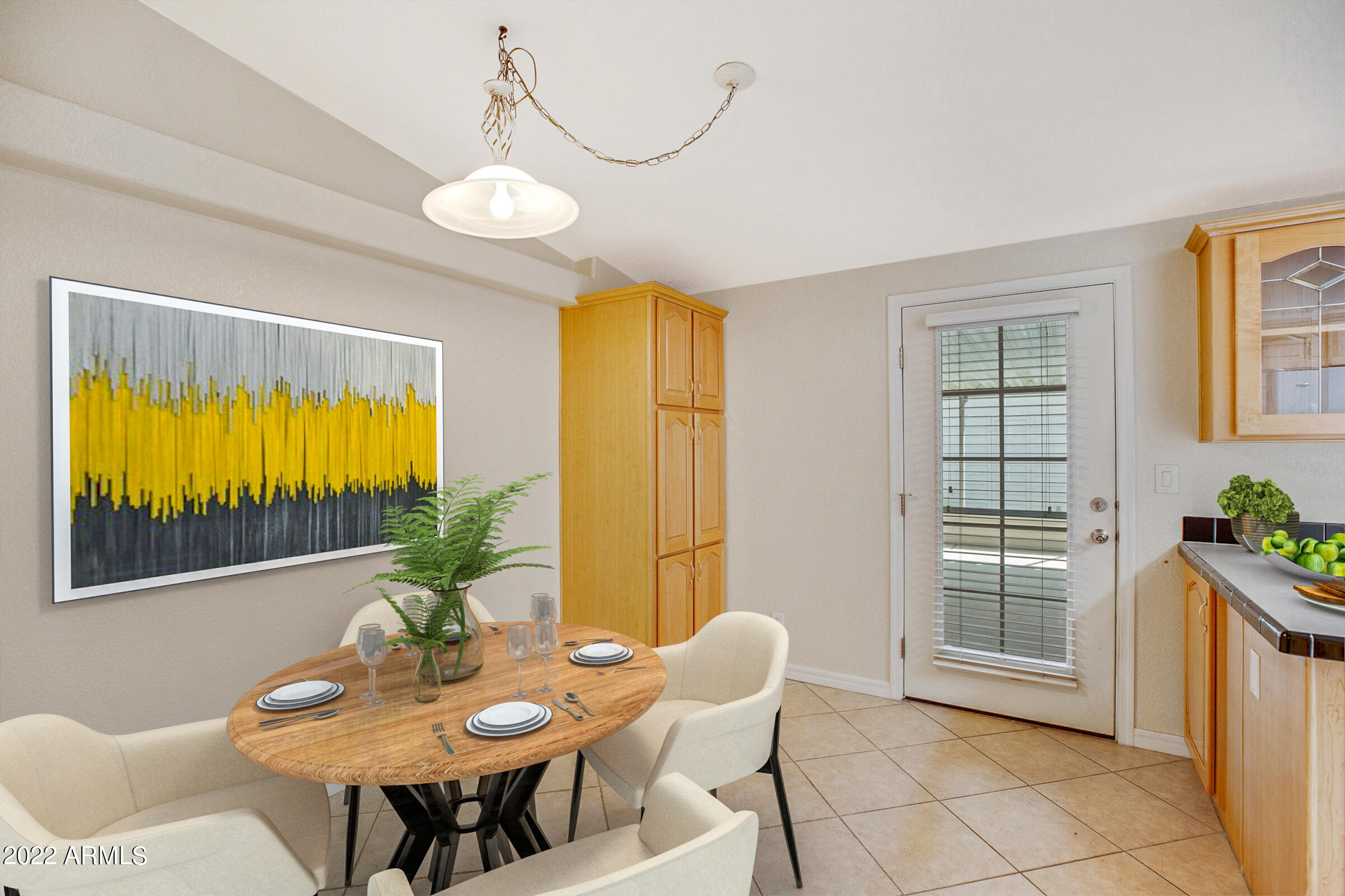 3301 South Goldfield Road, Unit 4083 Apache Junction, AZ 85119 - Photo 5 of 12 a view of a dining room with furniture and window