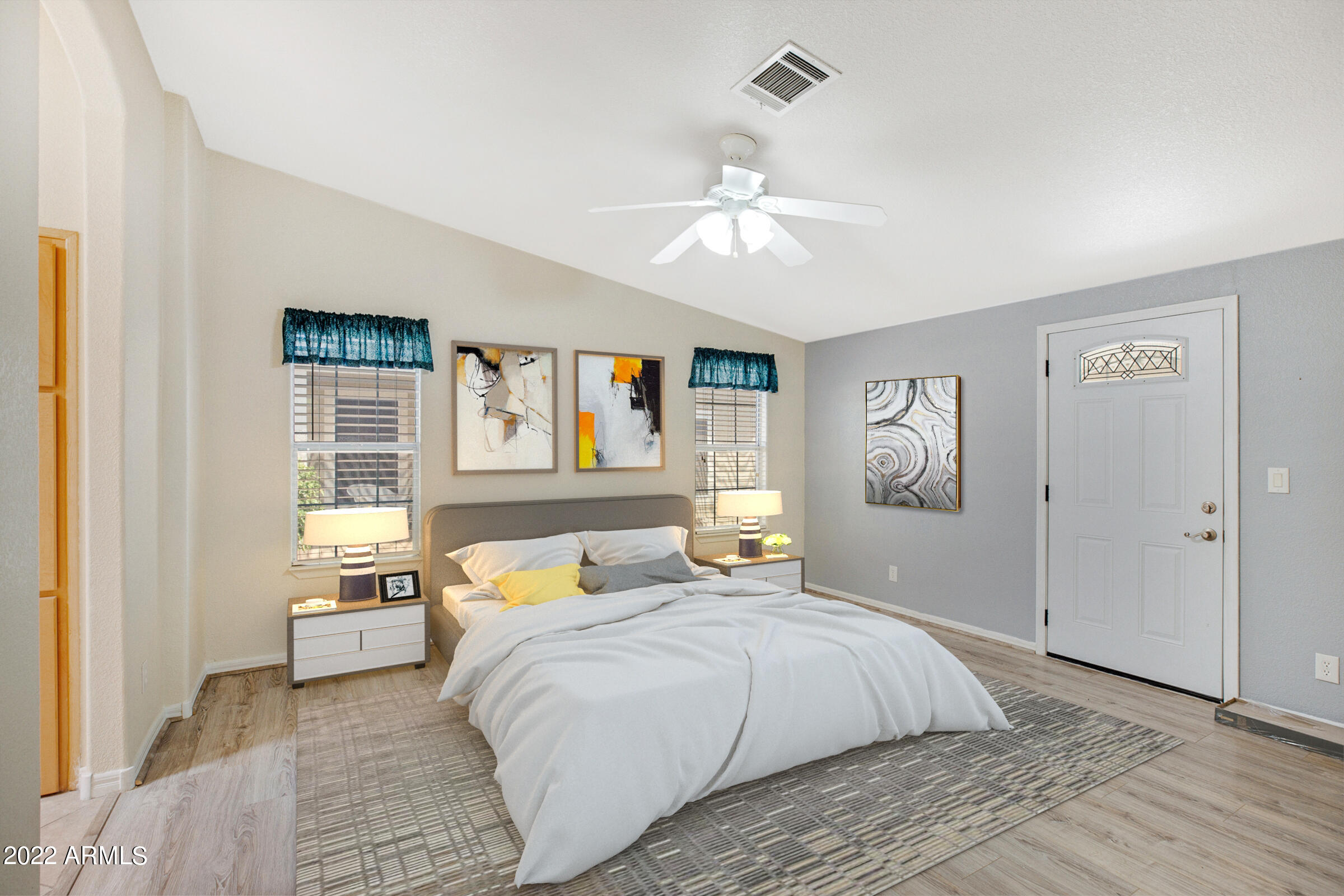 3301 South Goldfield Road, Unit 4083 Apache Junction, AZ 85119 - Photo 7 of 12 a bedroom with a large bed and a window