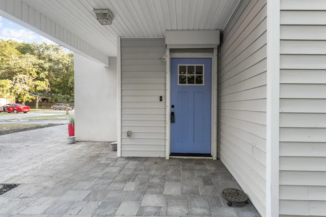 a kitchen with stainless steel appliances granite countertop a stove and a refrigerator