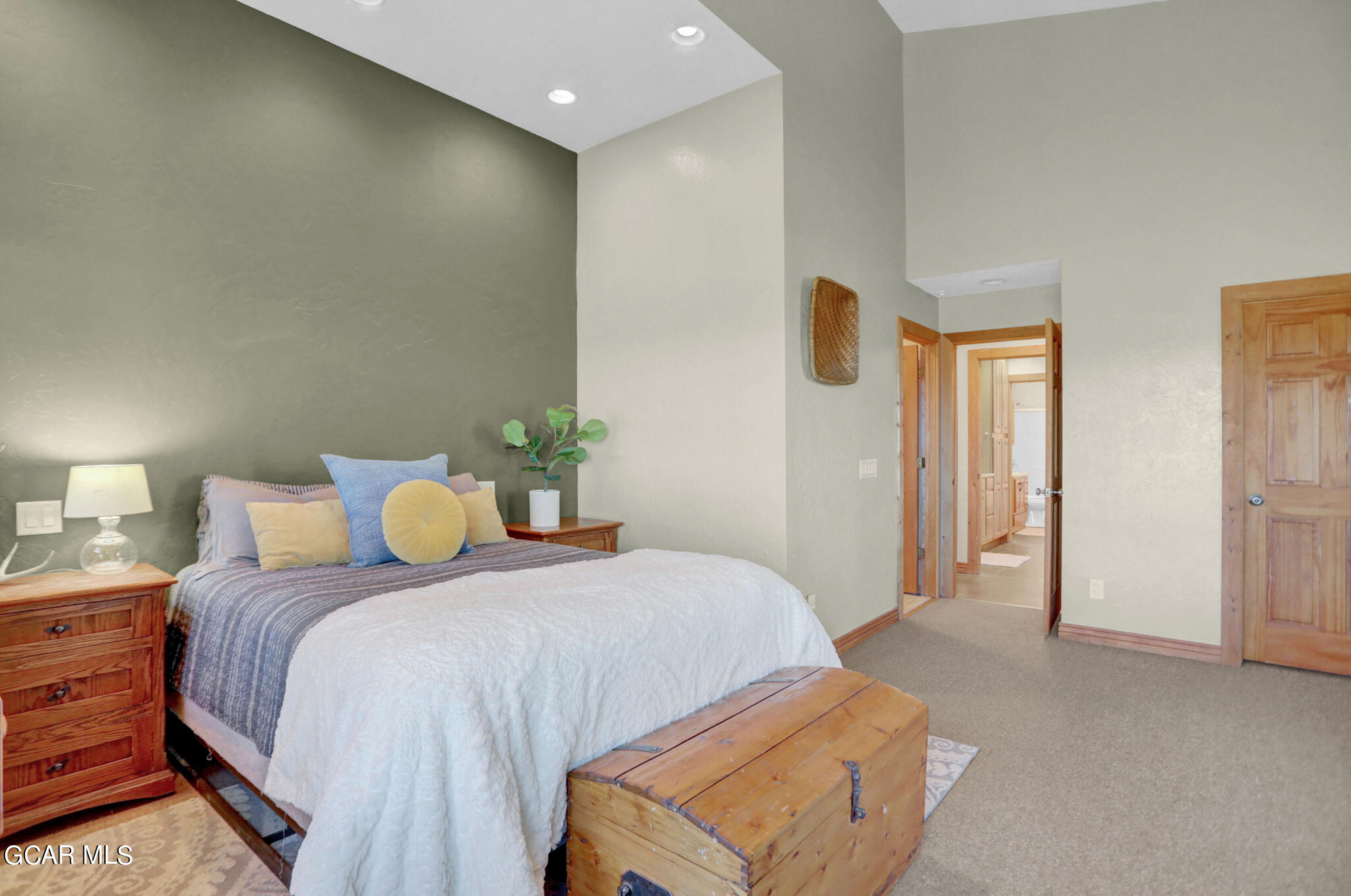 91 3rd Avenue Parshall, CO 80468 - Photo 12 of 48 a bedroom with a bed and a lamp