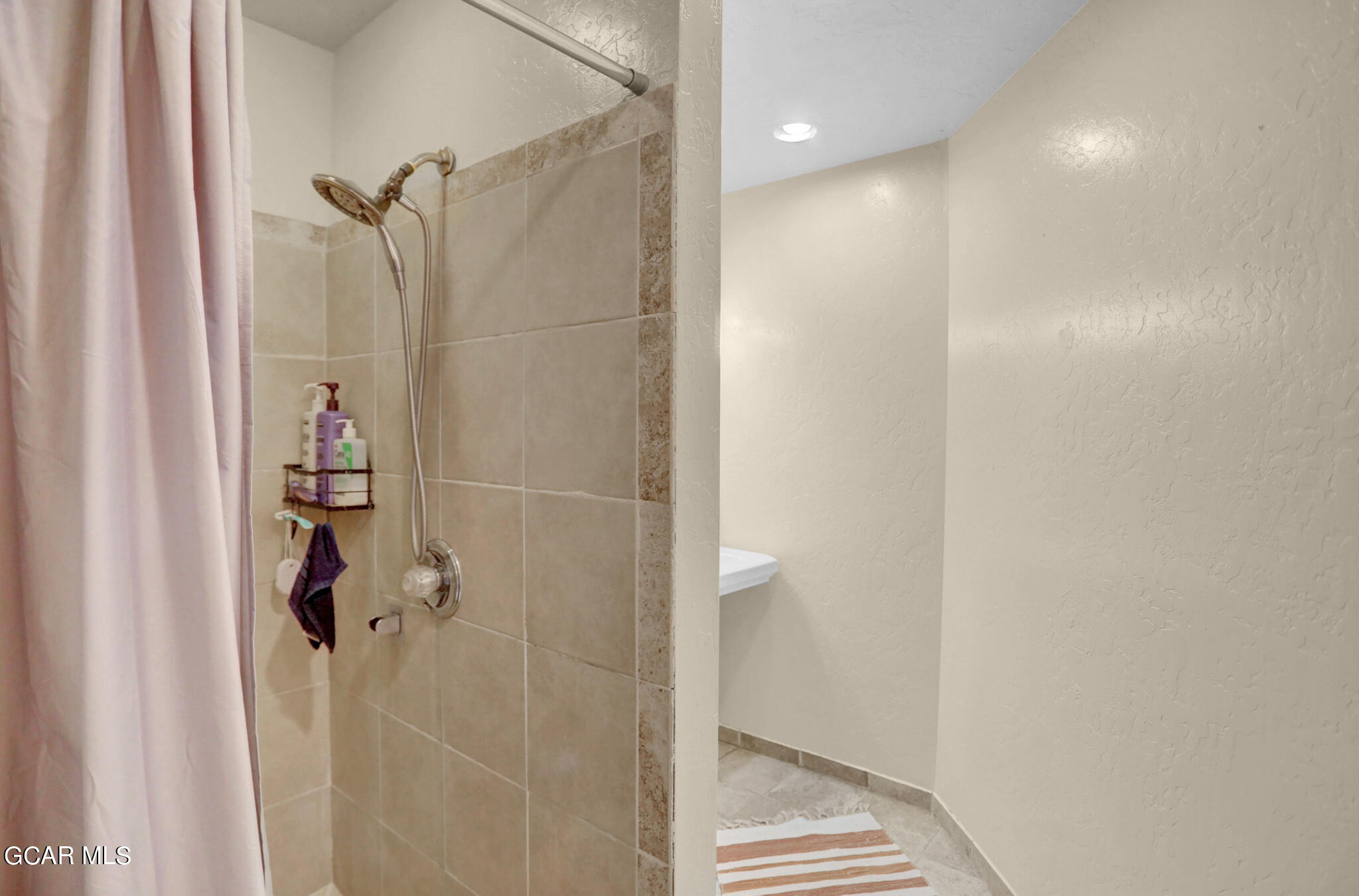 91 3rd Avenue Parshall, CO 80468 - Photo 16 of 48 a bathroom with a shower