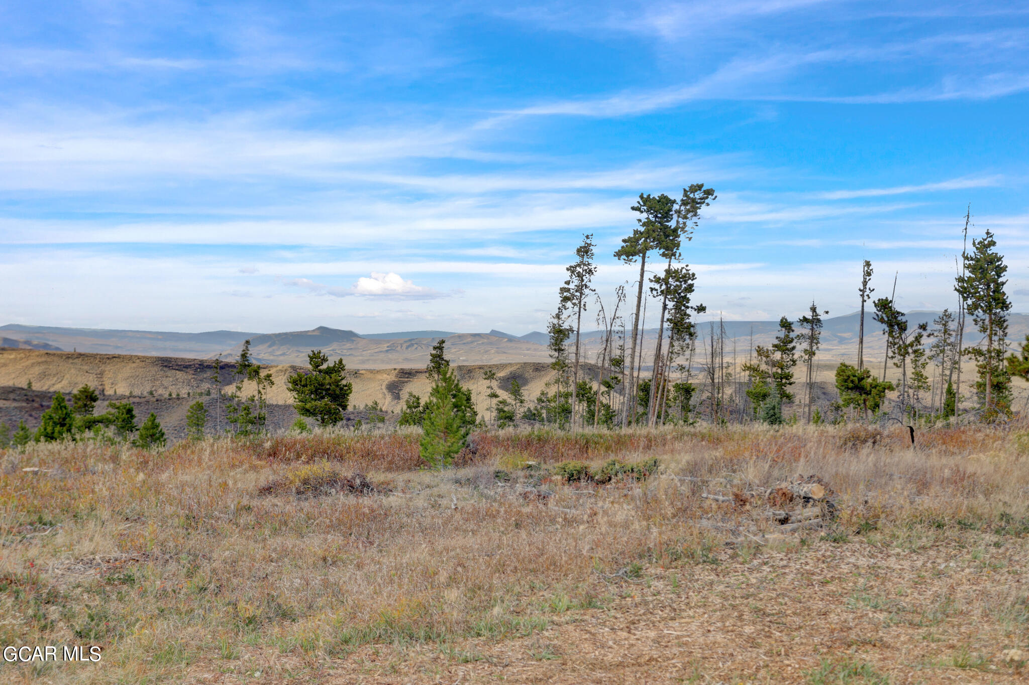 91 3rd Avenue Parshall, CO 80468 - Photo 31 of 48 a view of a dry yard with wooden fence