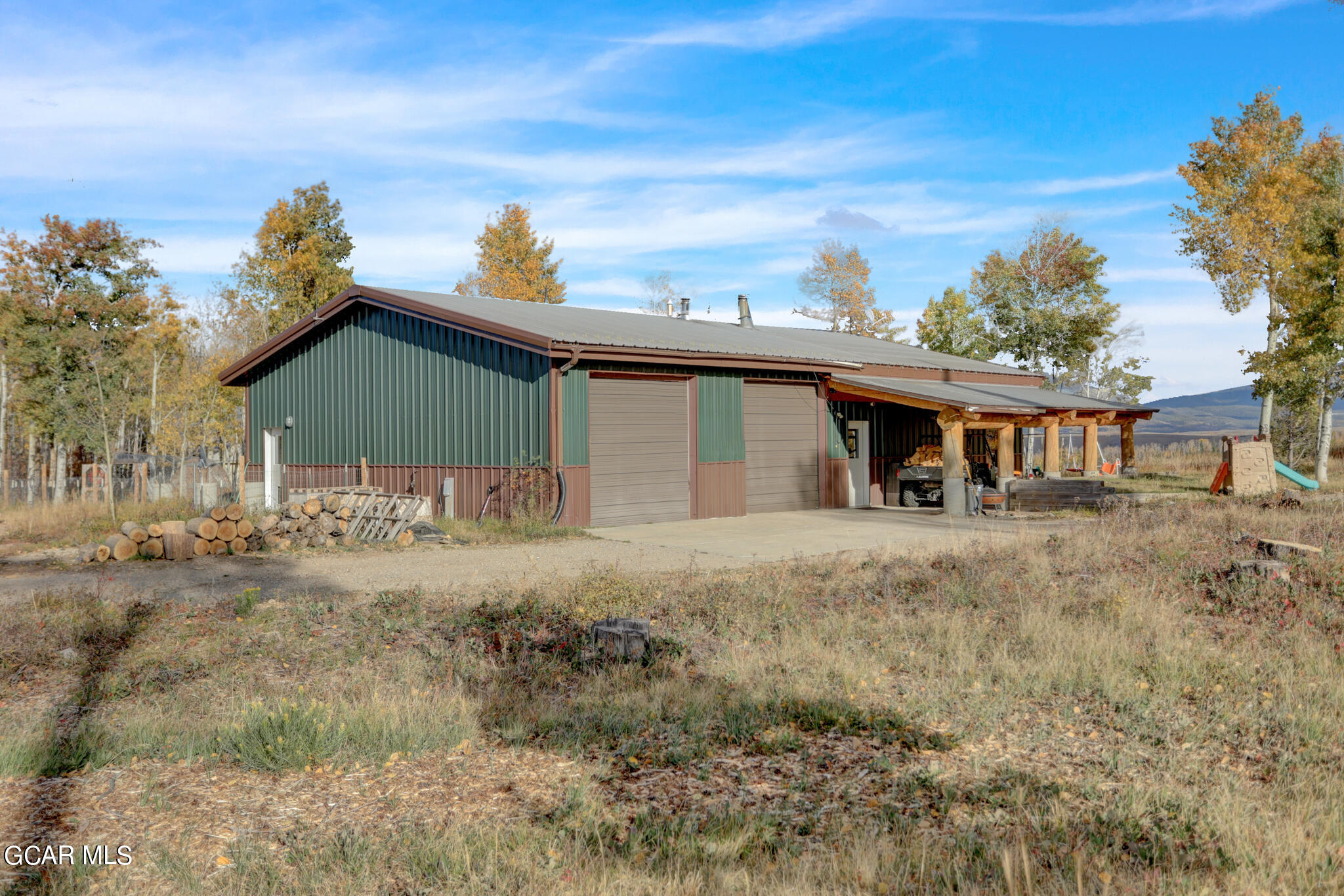 91 3rd Avenue Parshall, CO 80468 - Photo 33 of 48 a front view of a house with a yard
