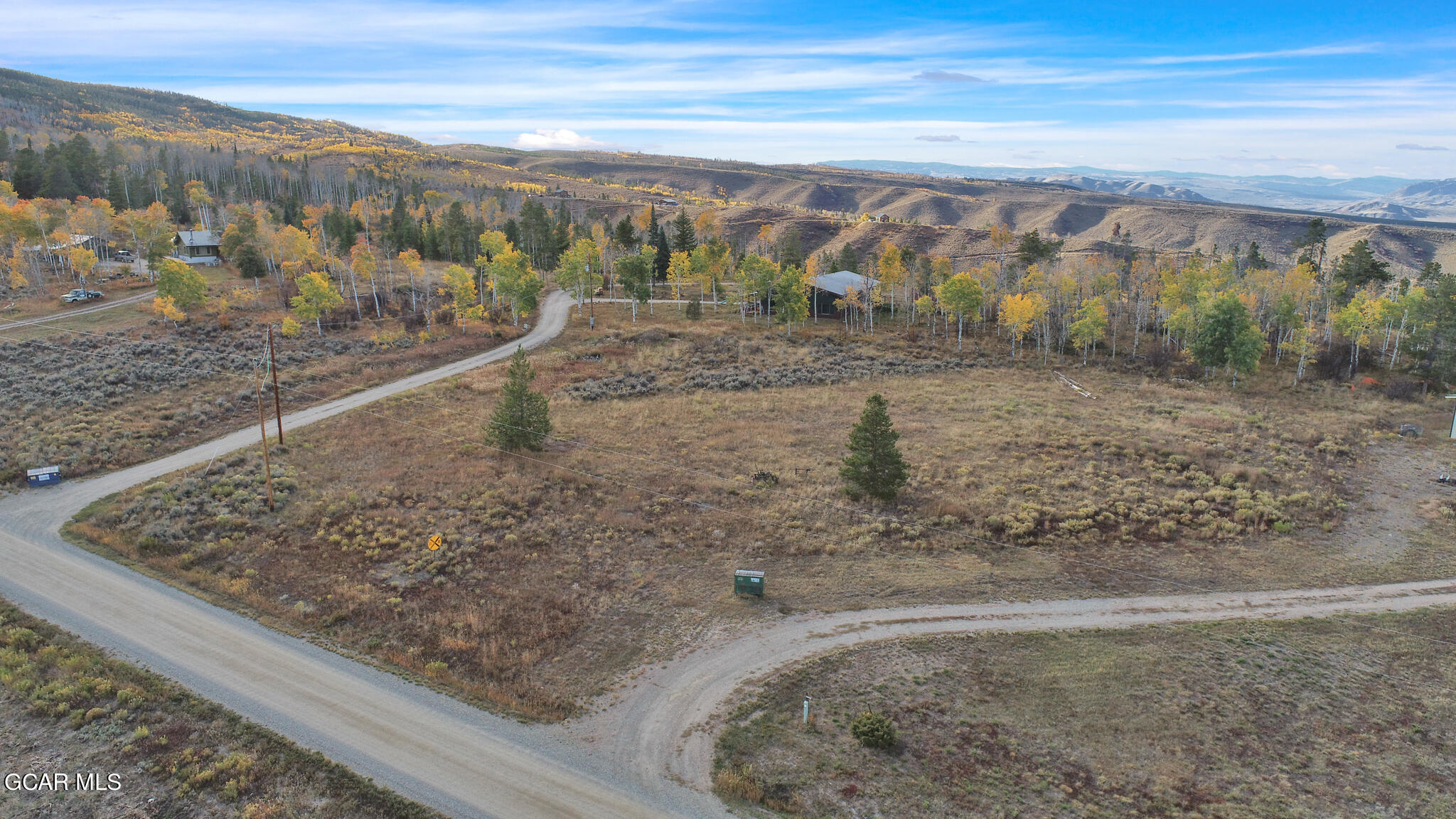 91 3rd Avenue Parshall, CO 80468 - Photo 35 of 48 a view of a dry yard with wooden fence