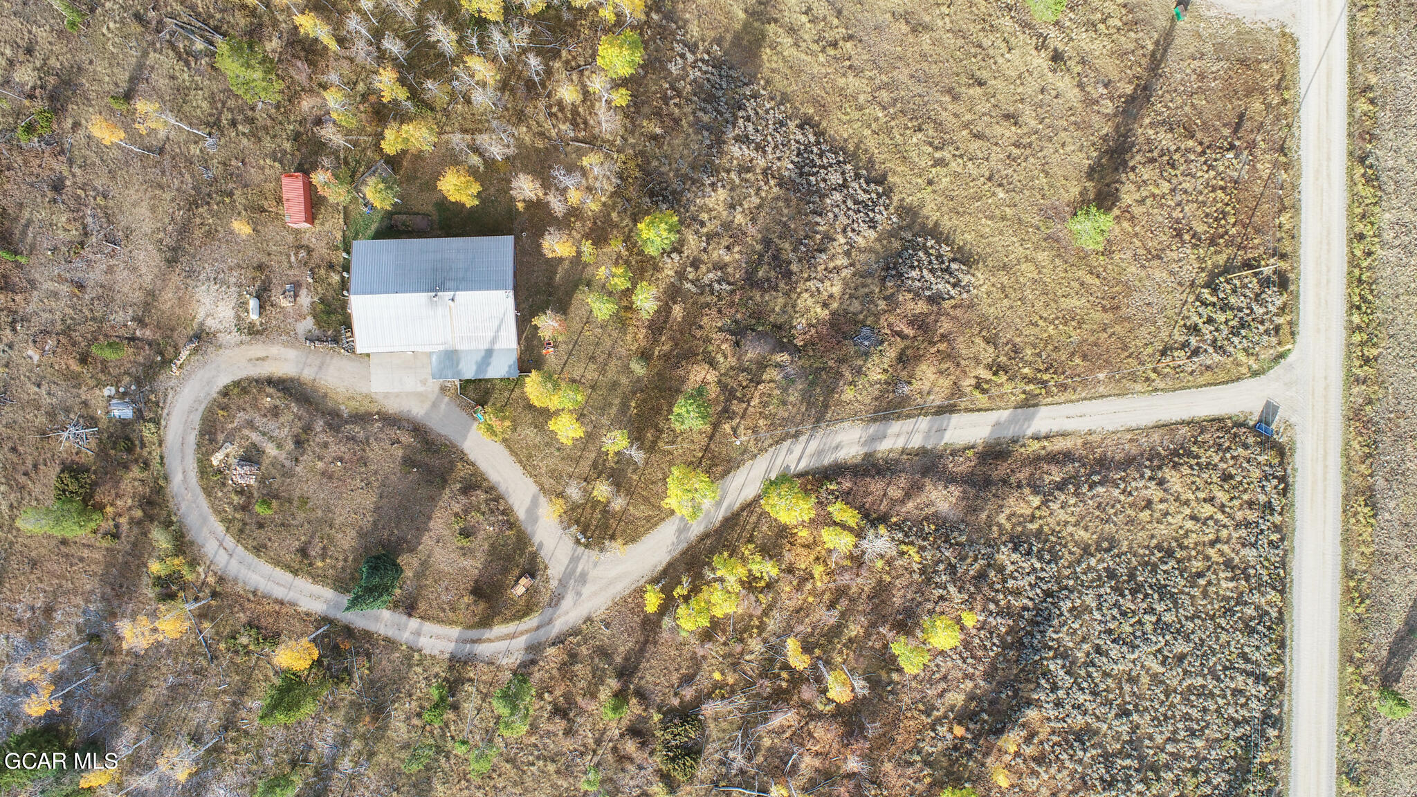 91 3rd Avenue Parshall, CO 80468 - Photo 42 of 48 a picture of a bathroom with a sink and a mirror