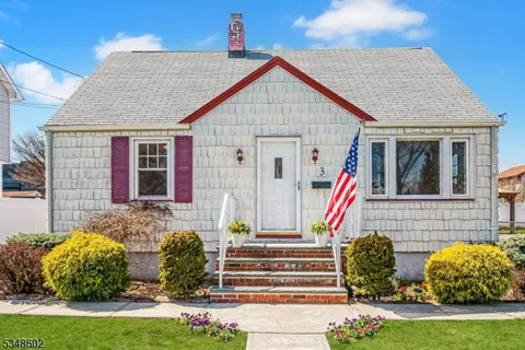 a front view of house with an outdoor space