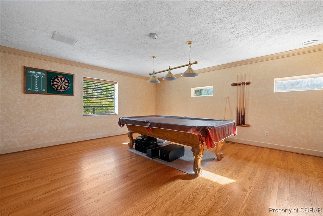 118 Paradise Point Road Yorktown, VA 23692 - Photo 27 of 50 Recreation room featuring a textured ceiling, light hardwood / wood-style floors, crown molding, and billiards