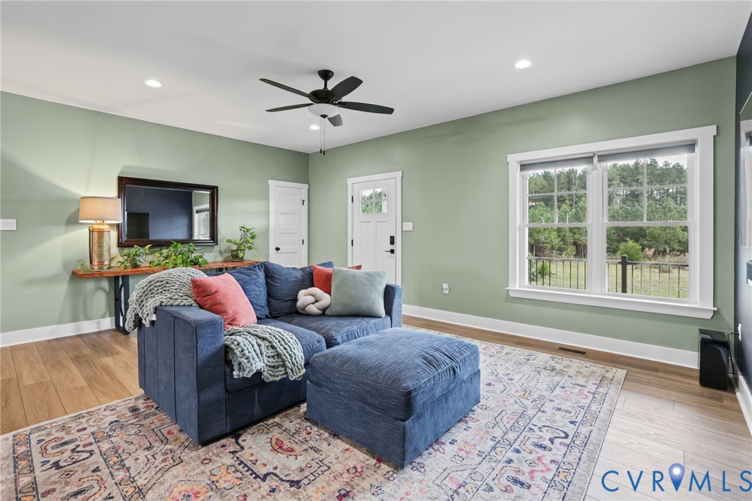 115 Jenkins Church Road Cumberland, VA 23040 - Photo 5 of 28 Recessed ceiling lights, wood-finish flooring, whi