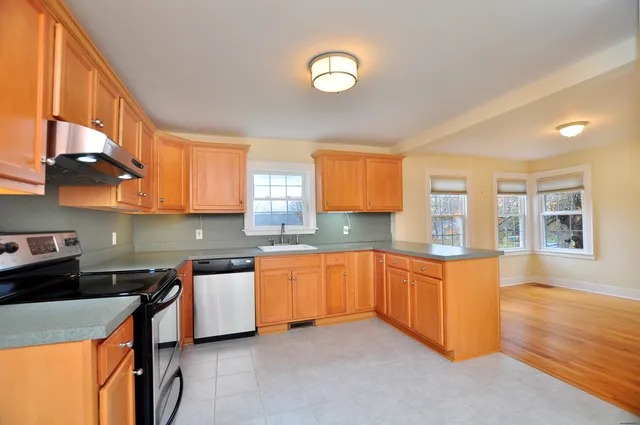 a view of a living room and bathroom