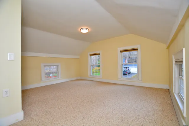 a bathroom with a sink a toilet and bathtub