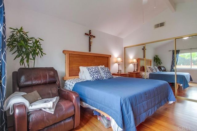 a bathroom with a double vanity sink and mirror