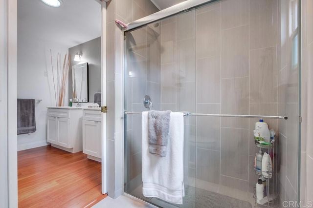 a view of a house with a backyard and sitting area