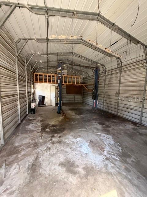 1701 Raleigh Avenue Daytona Beach, FL 32117 - Photo 15 of 16 a view of a big room with garage