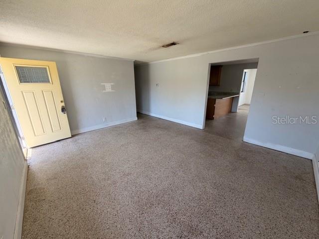 1701 Raleigh Avenue Daytona Beach, FL 32117 - Photo 2 of 16 a view of an empty room with a window