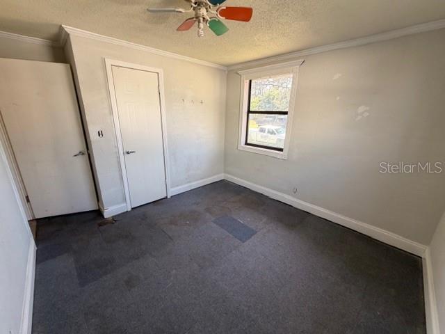 1701 Raleigh Avenue Daytona Beach, FL 32117 - Photo 4 of 16 an empty room with a window