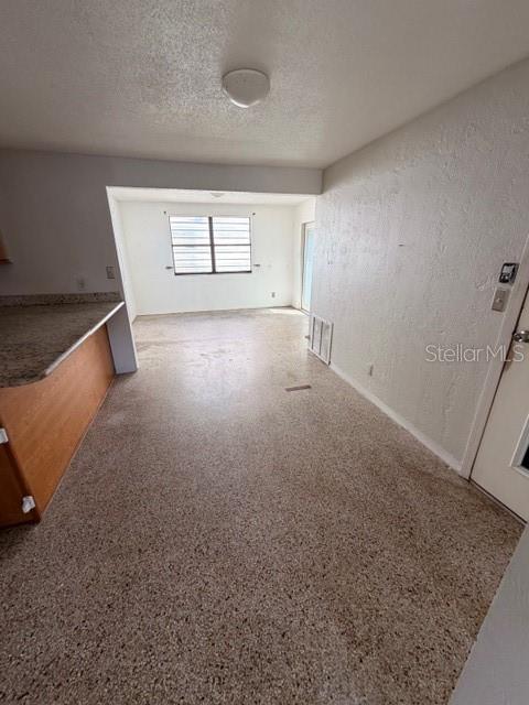 1701 Raleigh Avenue Daytona Beach, FL 32117 - Photo 9 of 16 an empty room with windows