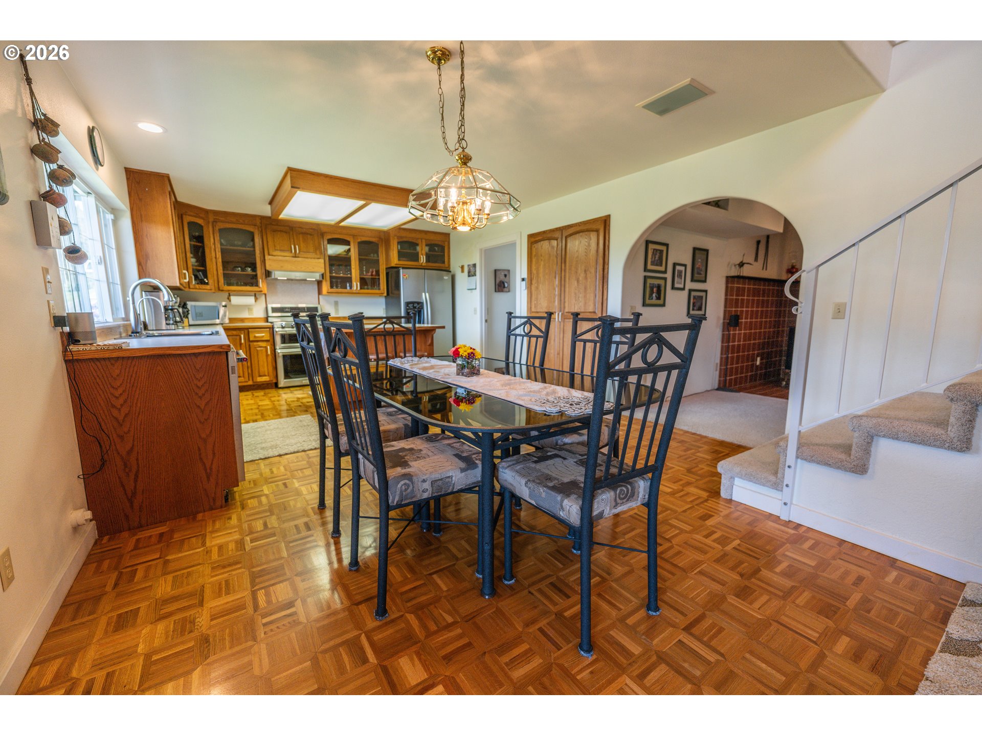 489 Fir Vista Road Sutherlin, OR 97479 - Photo 7 of 47 a view of a dining room with furniture and chandelier