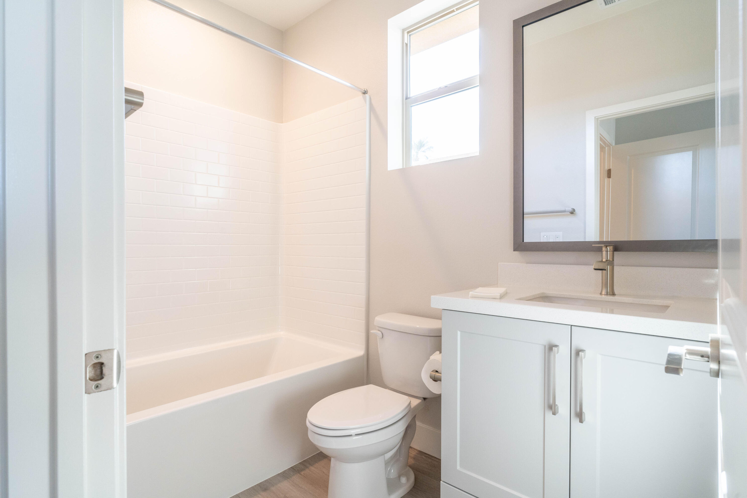 51580 Whiptail Drive Indio, CA 92201 - Photo 21 of 28 a bathroom with a sink toilet and shower