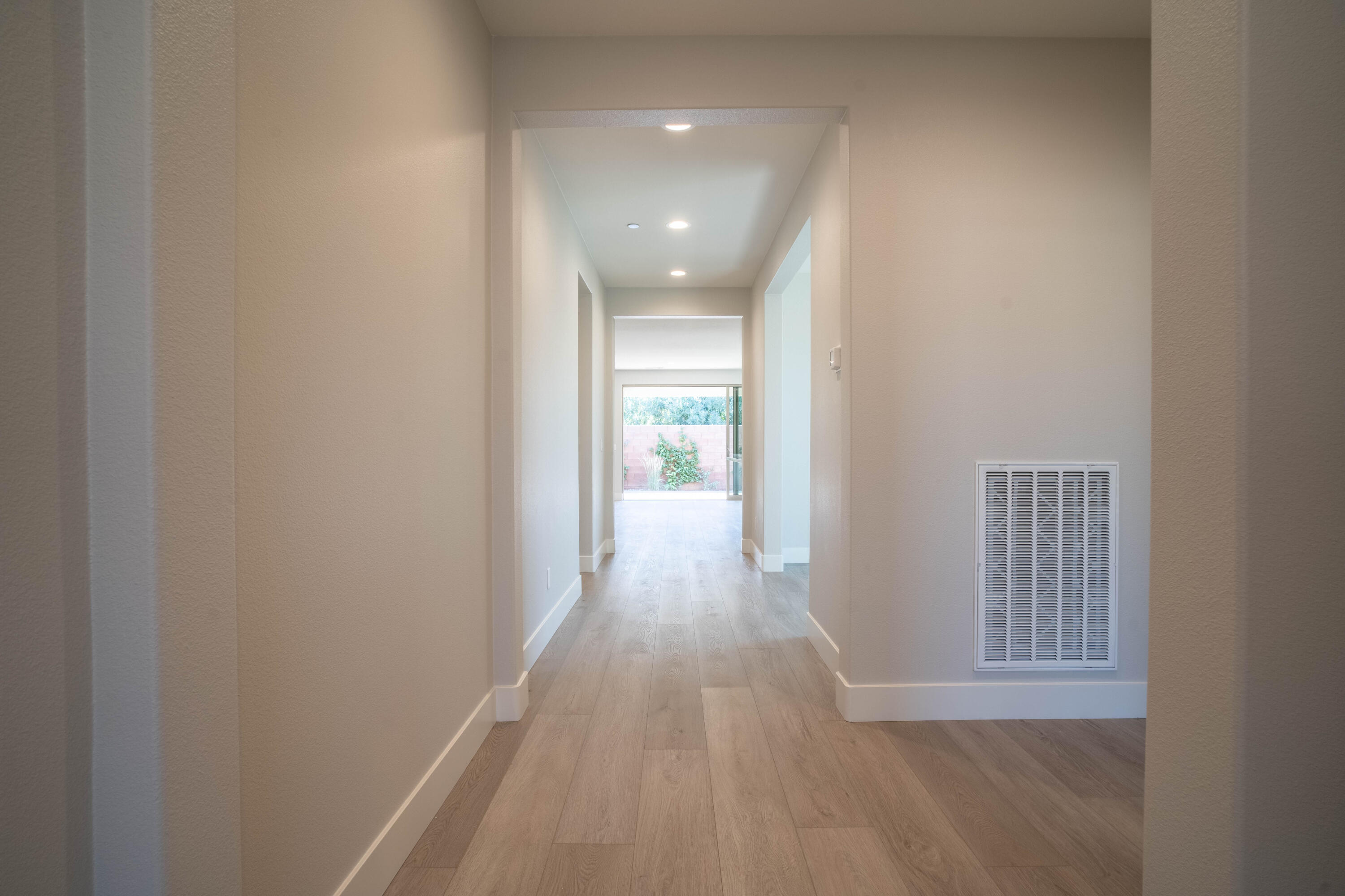 51580 Whiptail Drive Indio, CA 92201 - Photo 22 of 28 a view of hallway with wooden floor
