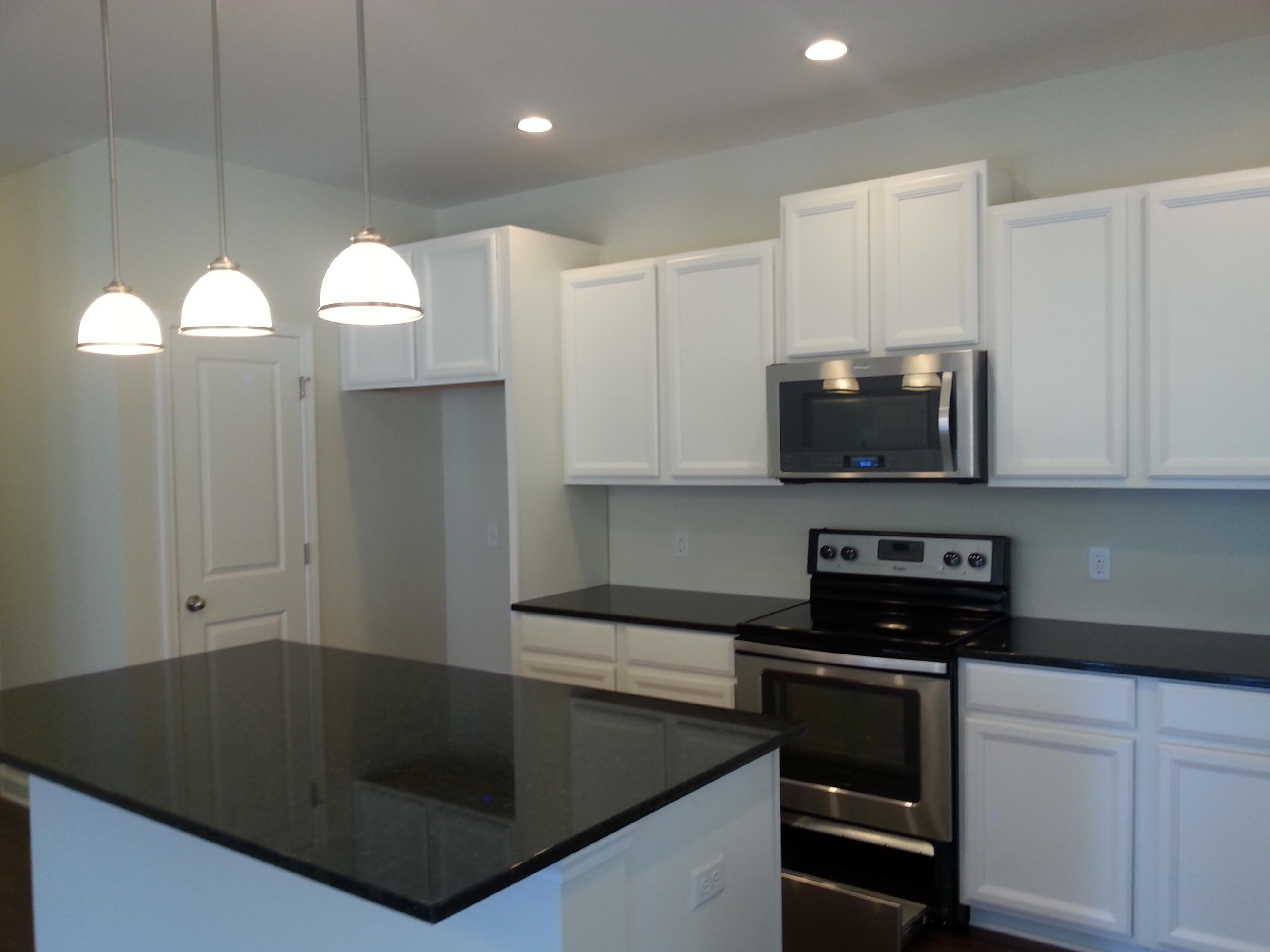 114 Cypress Plantation Road Moncks Corner, SC 29461 - Photo 7 of 17 White Kitchen Cabinets and Granite Count