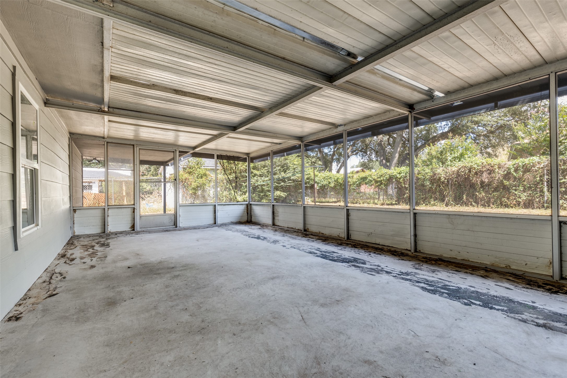 200 Pine Street Prairie View, TX 77446 - Photo 23 of 25 a view of an empty room with a sliding door