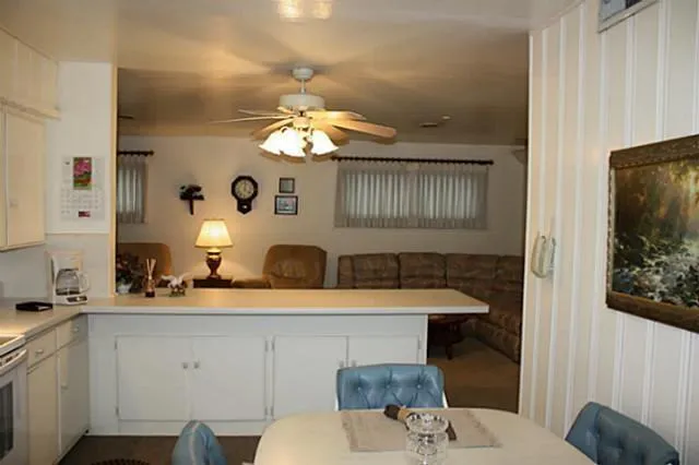 a bathroom with a sink a mirror and a toilet