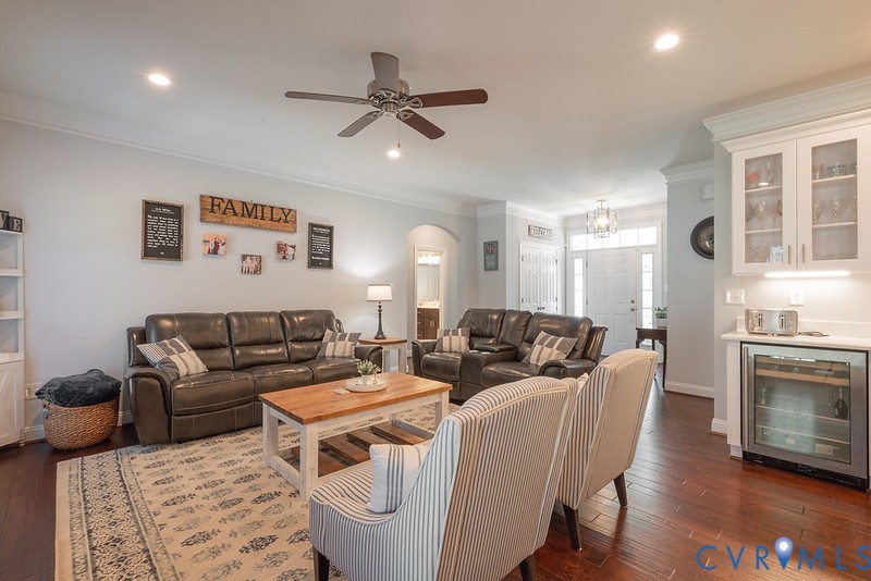 9425 Marie Road New Kent, VA 23124 - Photo 14 of 55 a living room with furniture a large window and a fireplace