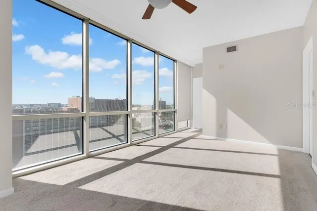 a spacious bathroom with a sink a toilet and a bathtub