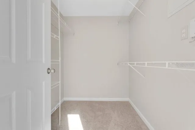 a bathroom with a bathtub a sink and a window