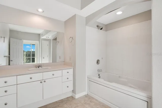 a view of a living room and a large window