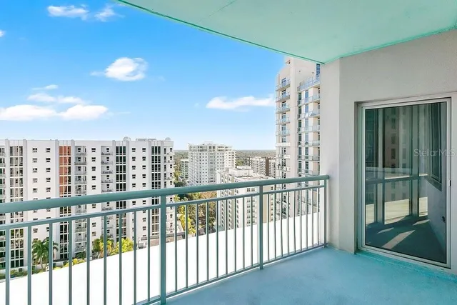 a view of a city with tall buildings