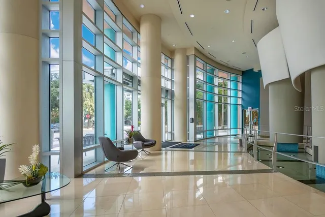 a view of a living room and kitchen