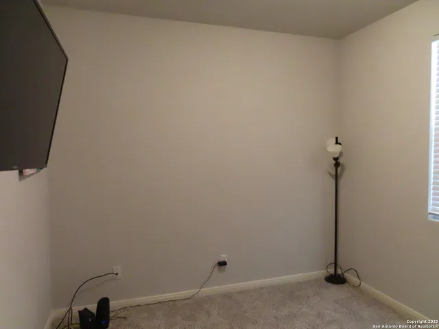 a view of a room with rack on the wall