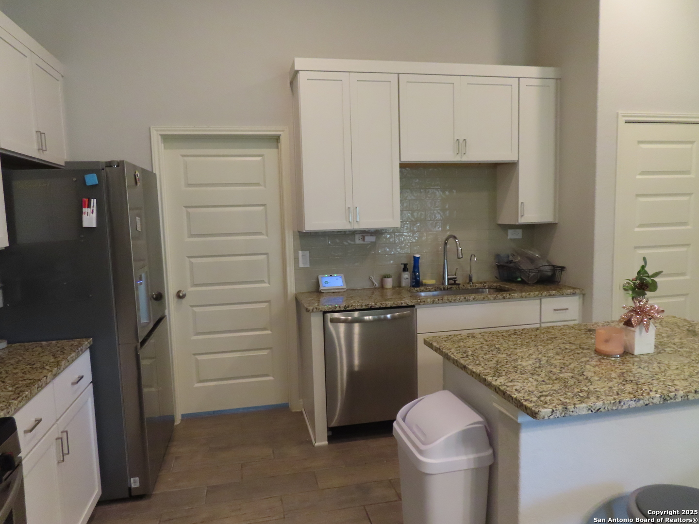 22150 Approach San Antonio, TX 78261 - Photo 9 of 18 a kitchen with sink refrigerator and stove