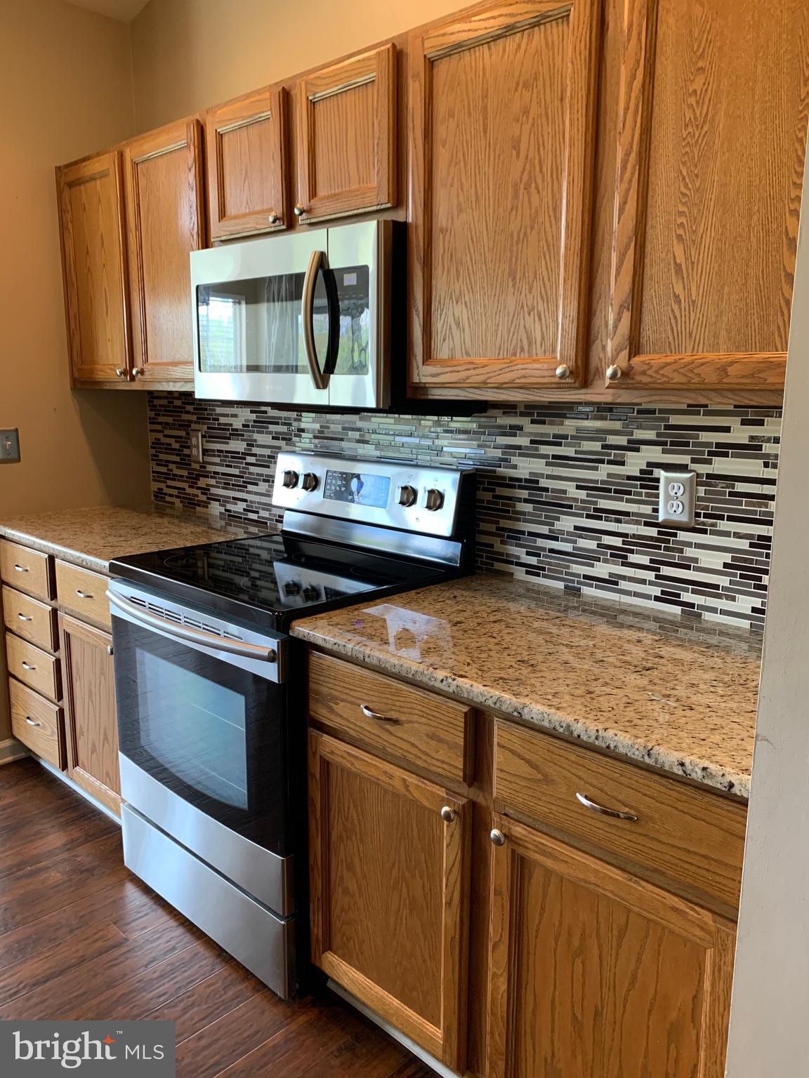 905 Blueleaf Court, Unit 7 3C Frederick, MD 21701 - Photo 8 of 24 Granite counters and stainless appliances