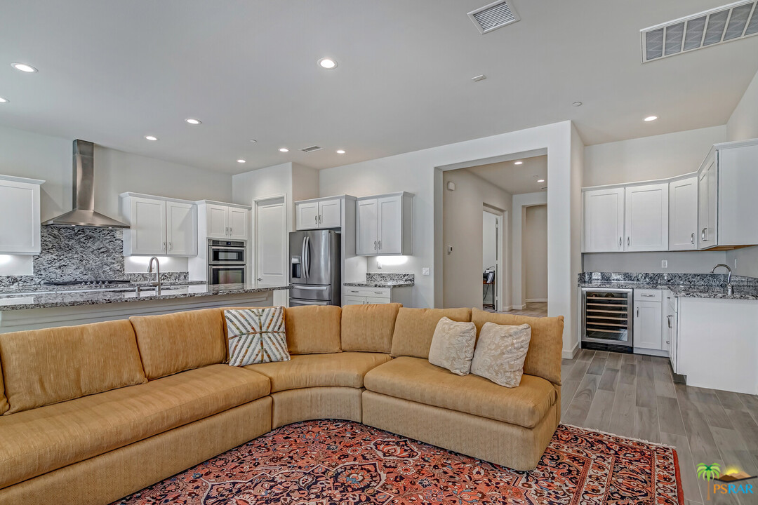 18 Riesling Rancho Mirage, CA 92270 - Photo 5 of 24 a living room with furniture and kitchen view