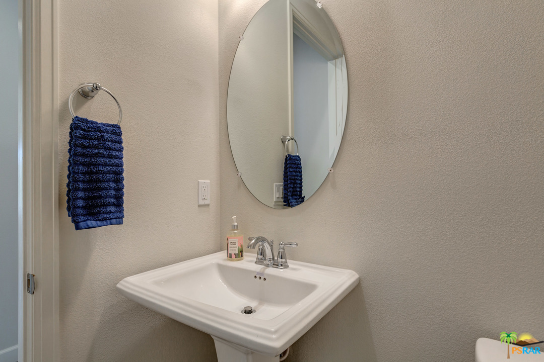 18 Riesling Rancho Mirage, CA 92270 - Photo 7 of 24 a bathroom with a sink and a mirror