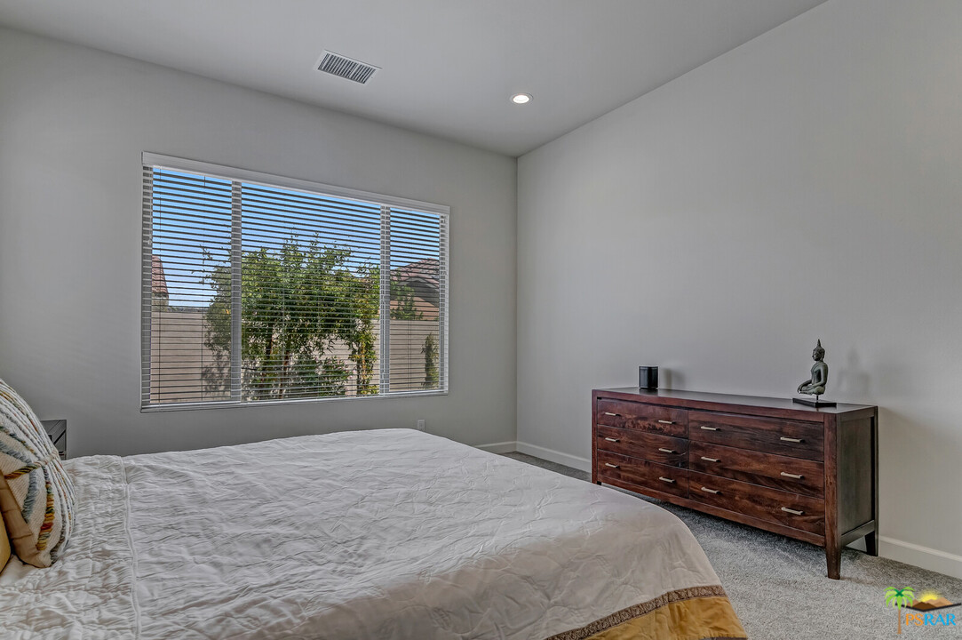 18 Riesling Rancho Mirage, CA 92270 - Photo 9 of 24 a bedroom with a bed and a window