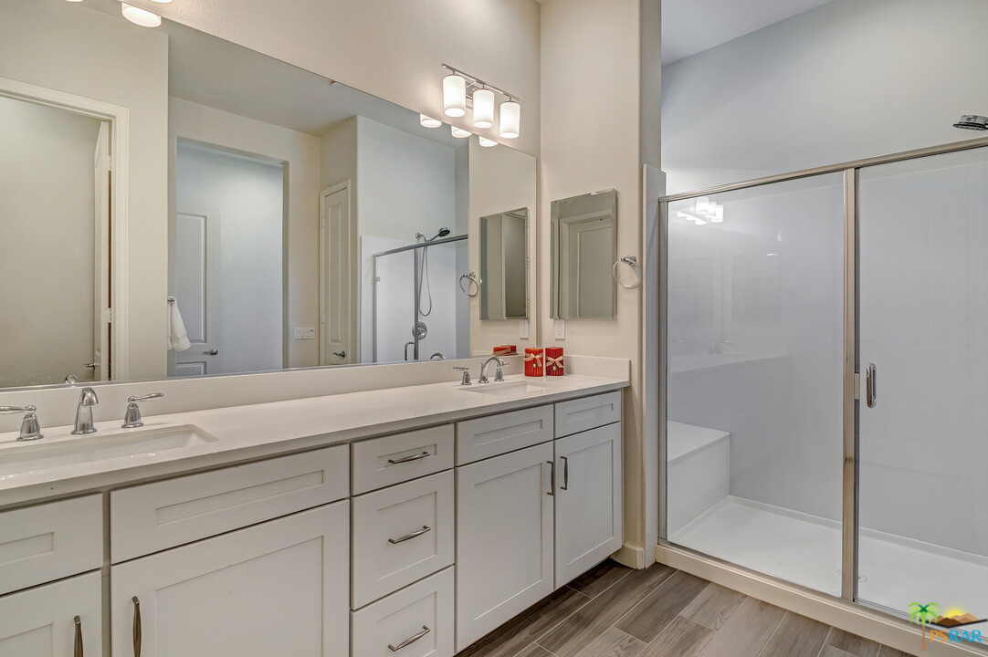 18 Riesling Rancho Mirage, CA 92270 - Photo 10 of 24 a bathroom with a double vanity sink and shower