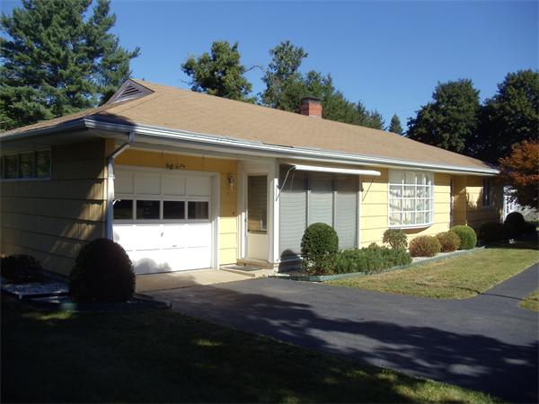 86 Greenwich Road Ware, MA 01082 - Photo 1 of 15 a front view of a house with a yard