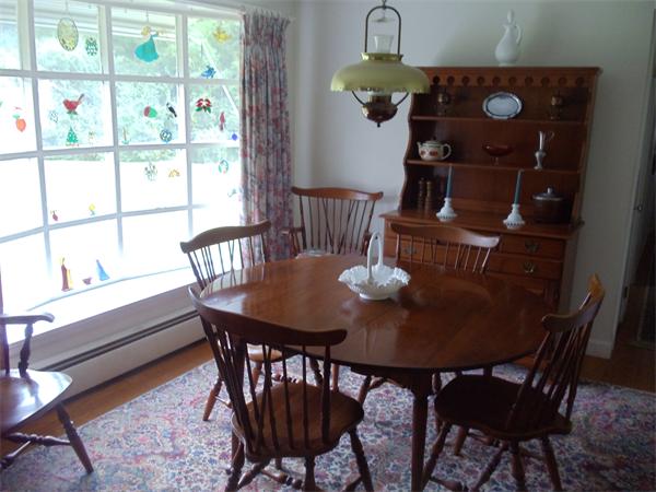 86 Greenwich Road Ware, MA 01082 - Photo 2 of 15 a view of a dining room with furniture window and outside view