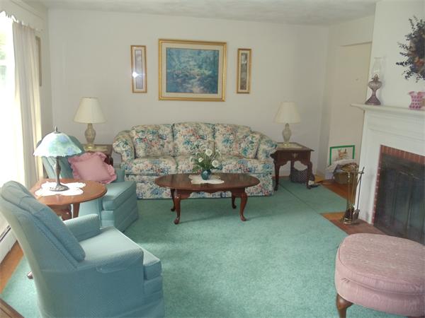 86 Greenwich Road Ware, MA 01082 - Photo 3 of 15 a living room with furniture and a fireplace
