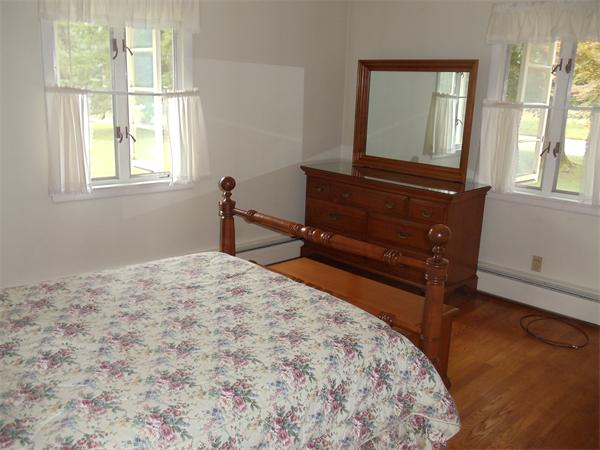 86 Greenwich Road Ware, MA 01082 - Photo 6 of 15 a bedroom with a bed and a window