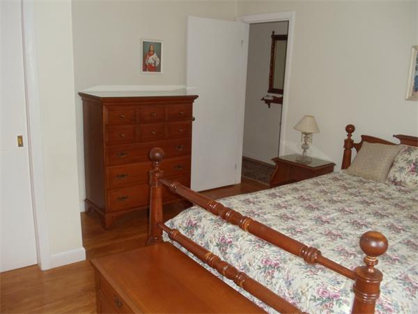 86 Greenwich Road Ware, MA 01082 - Photo 7 of 15 a bedroom with a bed and dresser