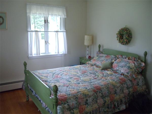 86 Greenwich Road Ware, MA 01082 - Photo 9 of 15 a bedroom with a bed and a window