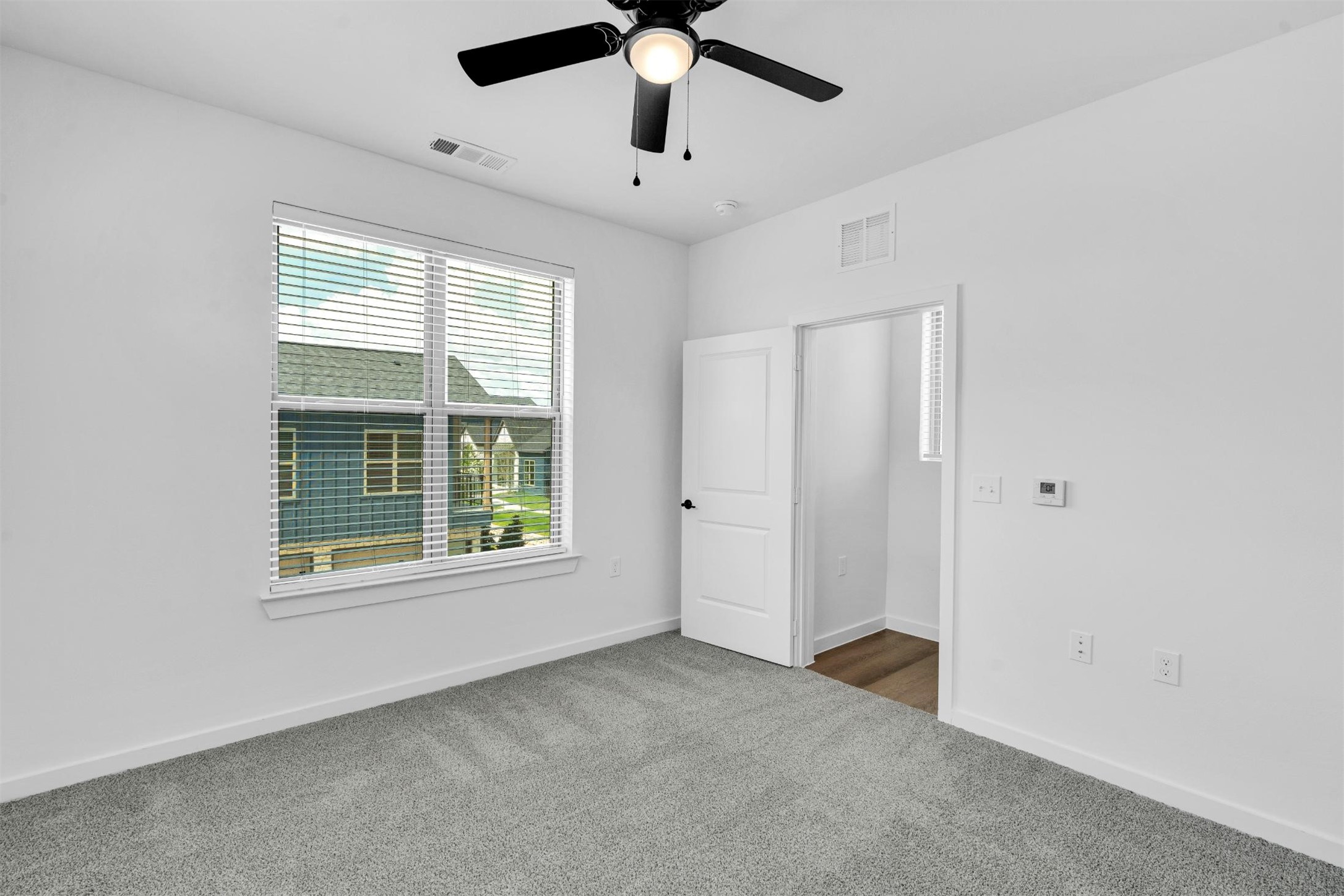 1412 A Izzy Lane Little Elm, TX 75068 - Photo 11 of 38 a view of an empty room with a window