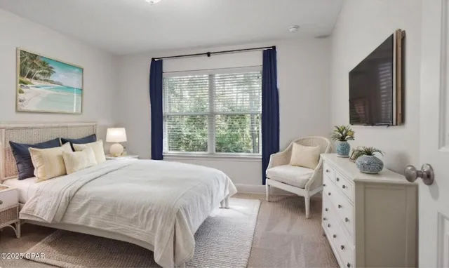 an aerial view of a house with a yard basket ball court and outdoor seating