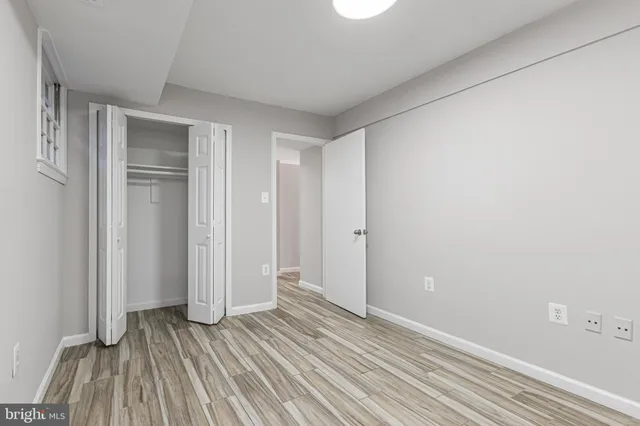 a view of an empty room and window